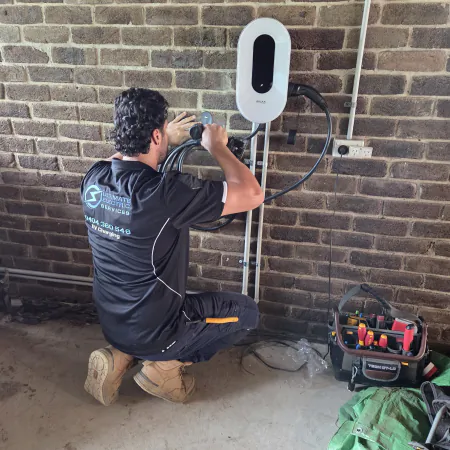 Electrician installing SolaX Power EV Charger