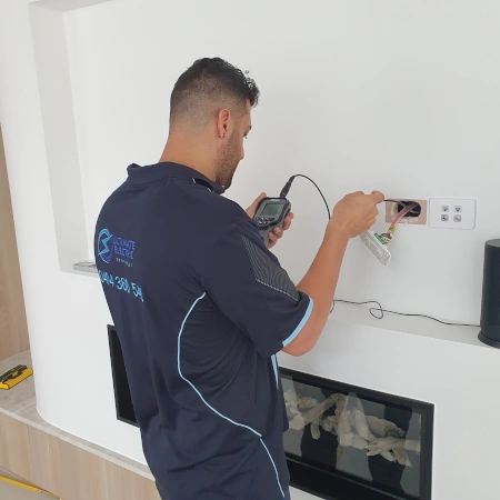 Electrician installing data points for improved internet connectivity