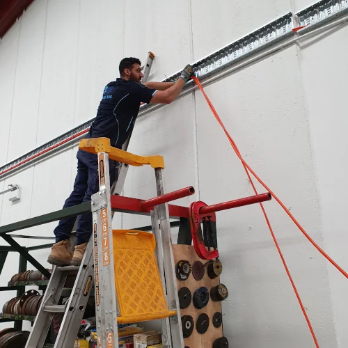 Industrial switched socket outlet installation using ladder trays