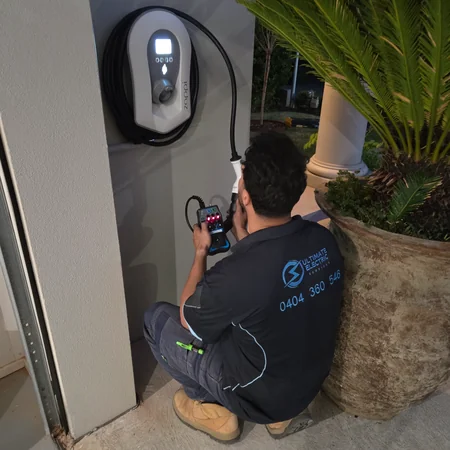 Electrician installing Myenergi Zappi solar EV Charger